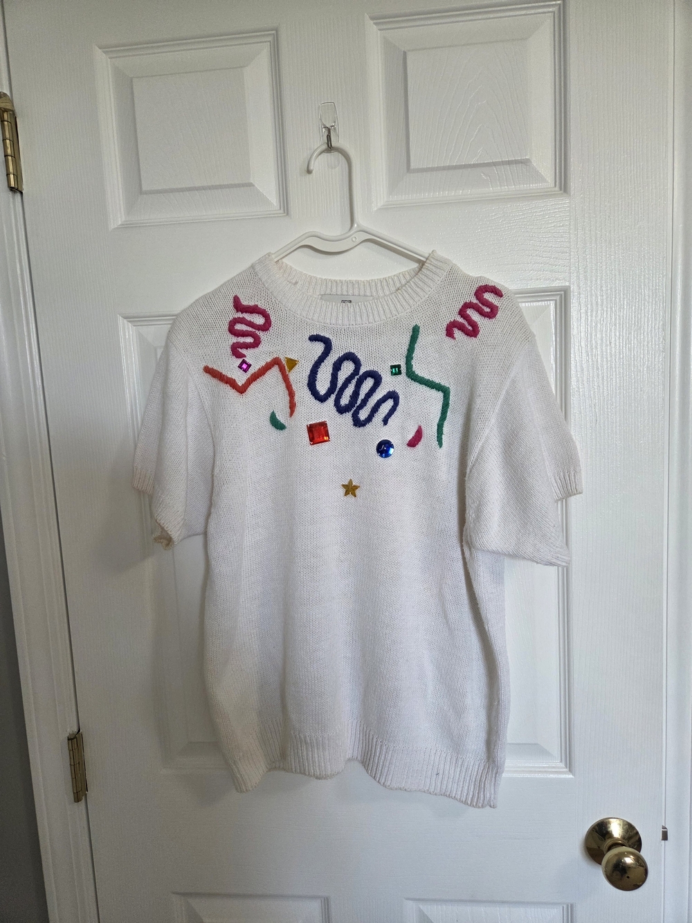 White Knit Short-Sleeve Sweater with Colorful Embellishments